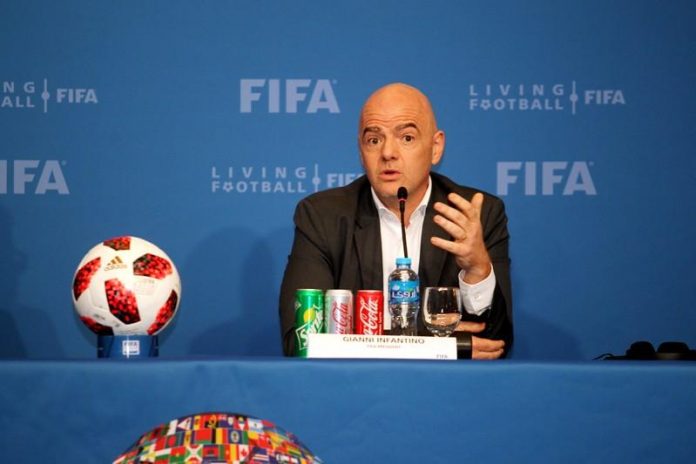 FIFA president Gianni Infantino speaks during a news conference in Doha